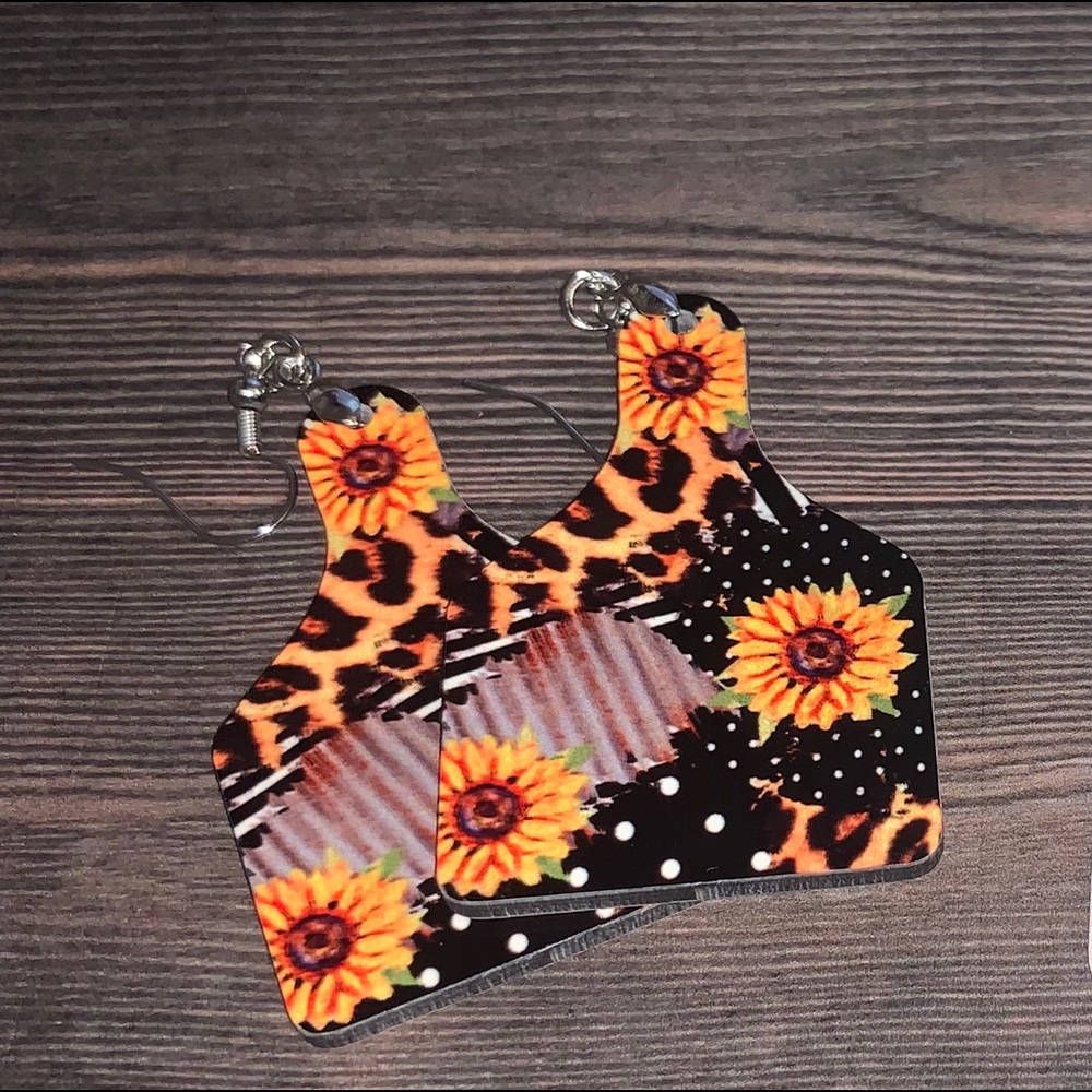 White and Black Dot Sunflower Cow Tag Earrings